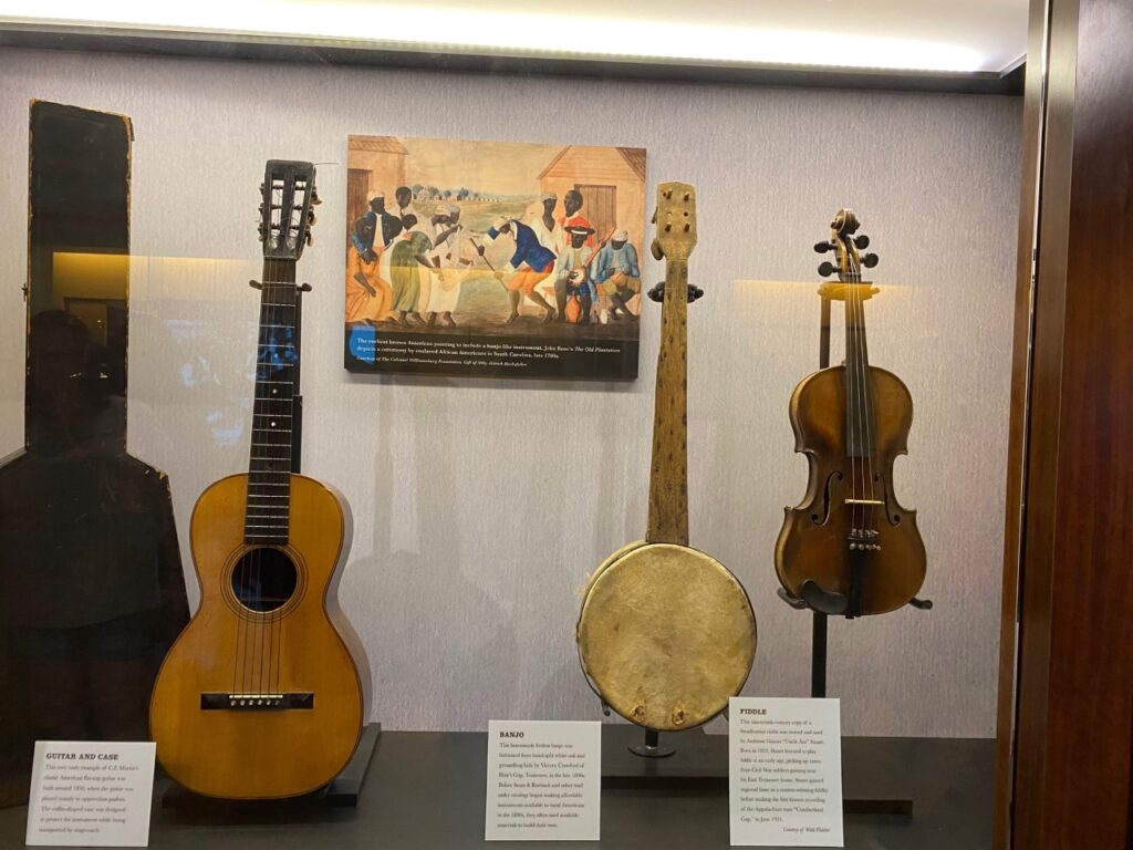 Guitars, banjos and fiddles are primary instruments in growth of country music.