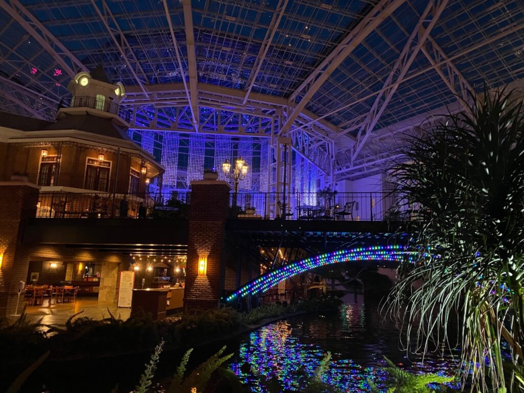 Views of Delta Atrium and Delta River at night