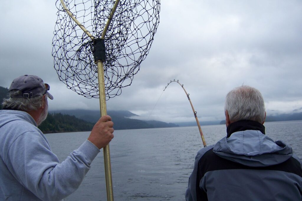 Richard reels in his first catch of the day.