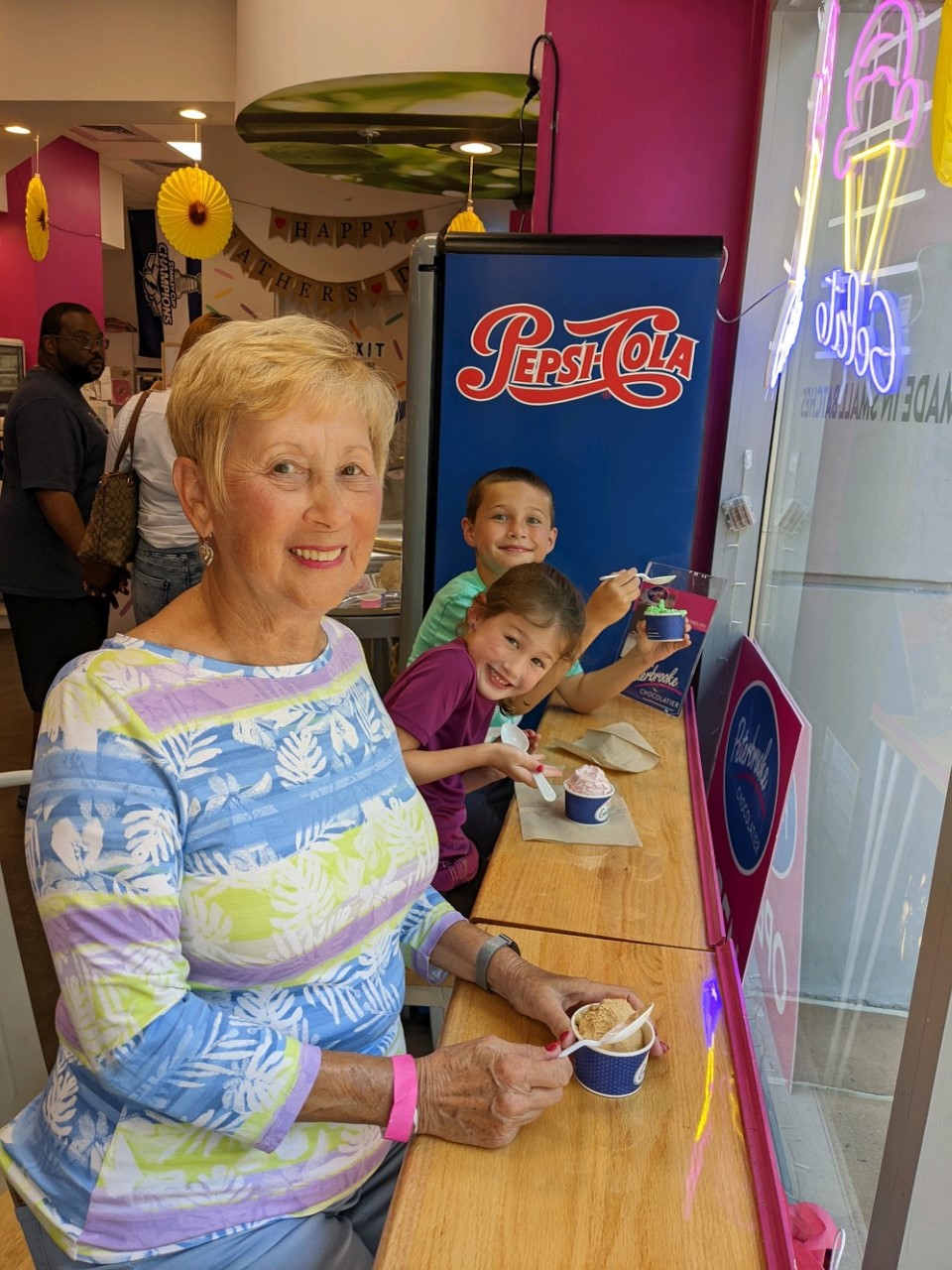 Great Aunt Charlene with Kaia and Keaton enjoying Gelato.