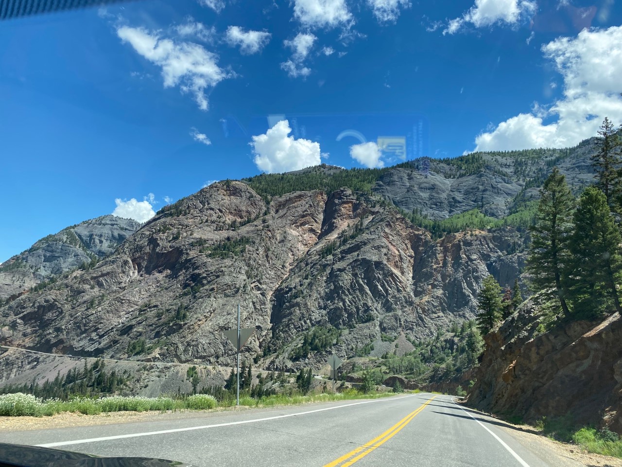 The Million Dollar Highway cuts along the edge of the mountains to Ouray.
