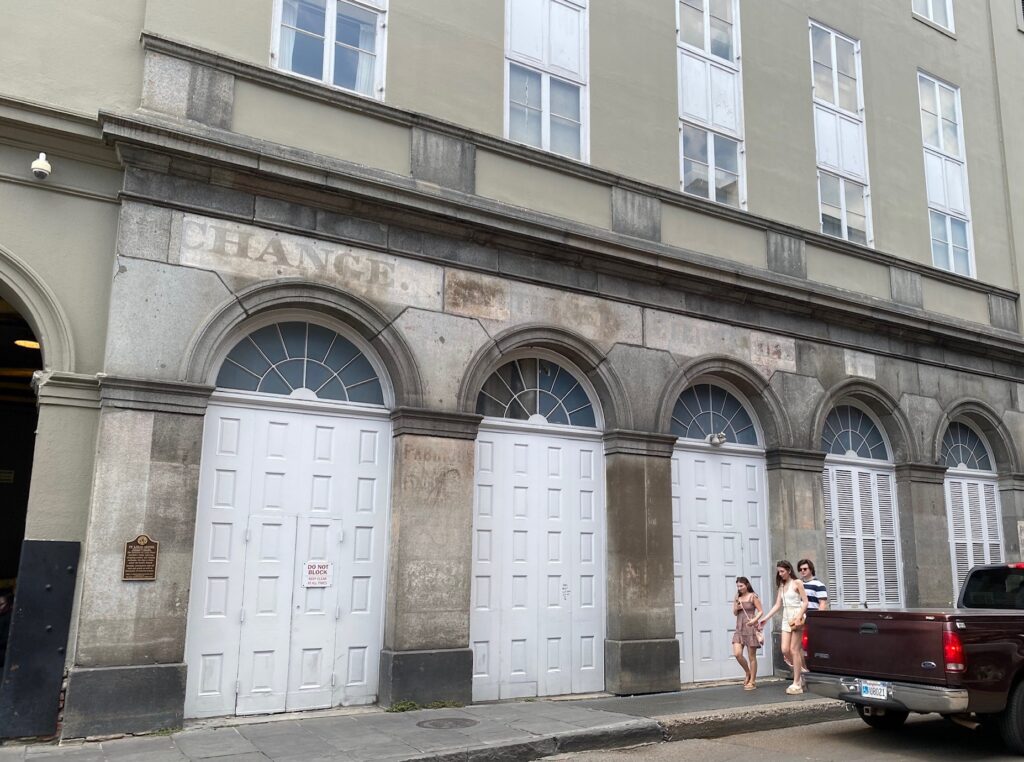 Todd explains this building was one of the Slave Markets in New Orleans on the French Quarter Tour.