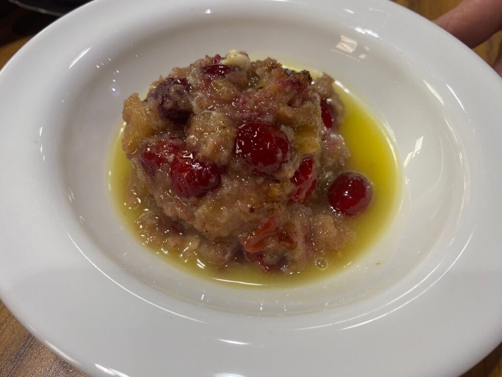 White Chocolate Bread Pudding with Cranberries and Hard Sauce.