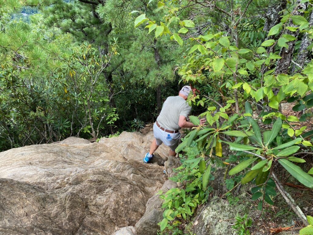 Finding good handholds and footholds are important descending the rocky areas.