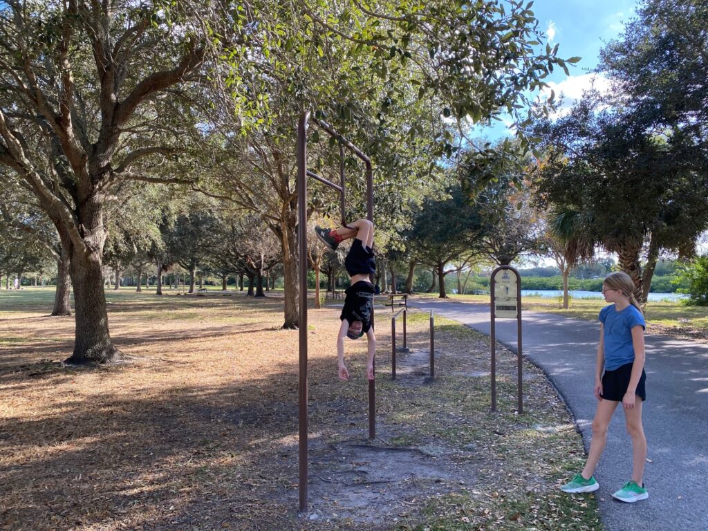 Louis is a bit of a "monkey" on the Uneven Bars.