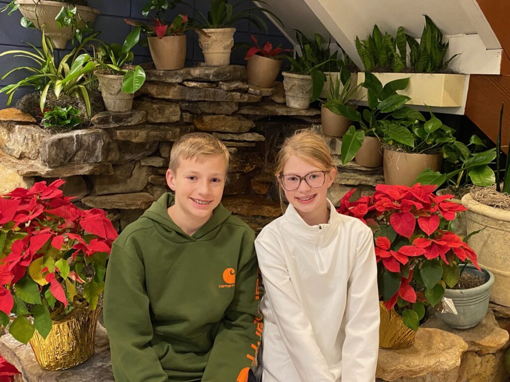 Louis & Lucy at the fountain inside the Safety Harbor Resort & Spa.