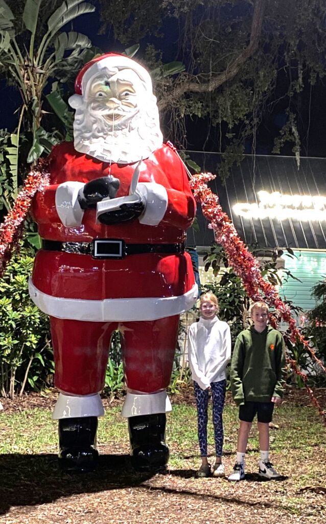 Of course, Louis & Lucy have to get a picture by the HUGE SANTA in Safety Harbor.