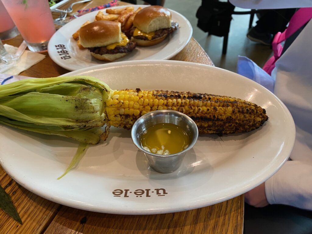 Luvy loves her lunch of Fried Corn and Sliders.