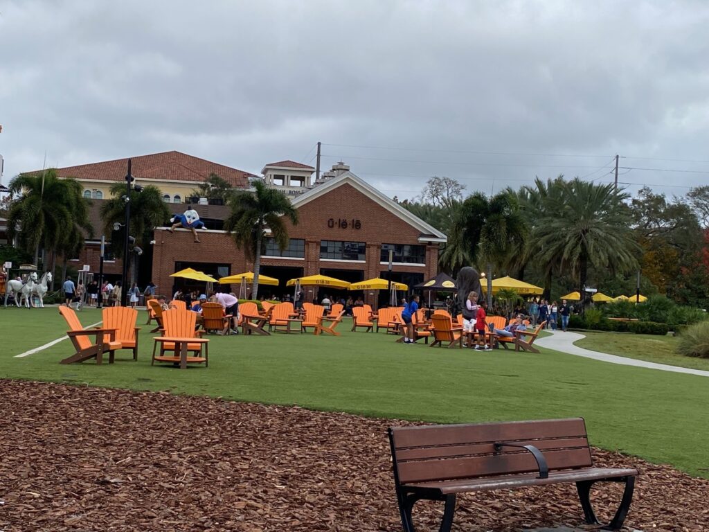 Ulele Restaurant with outdoor seating and activities on Tampa Riverwalk .