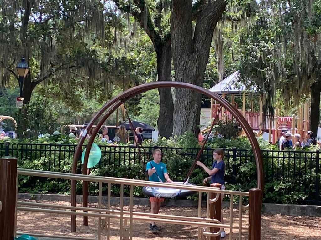 Louis and Lucy have fun at the Forsyth Park Playground.