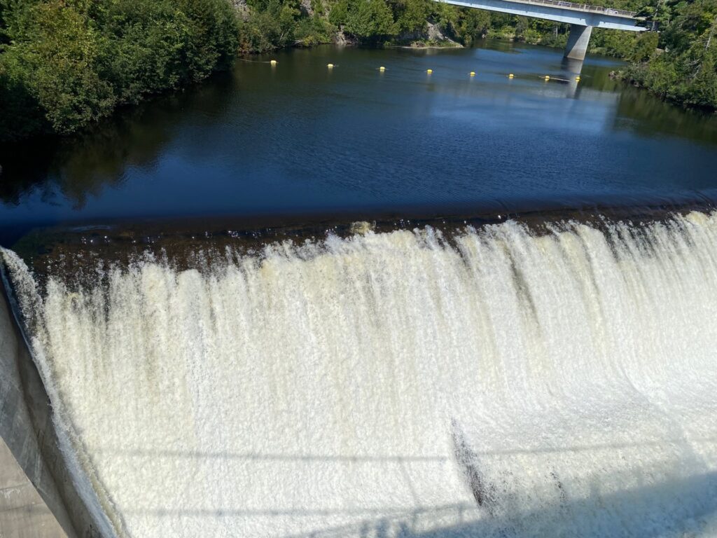 Looking to the left of the Suspension Bridge, we see the Montmorency River drops over a ridge before crashing over the cliffs that create the waterfall.